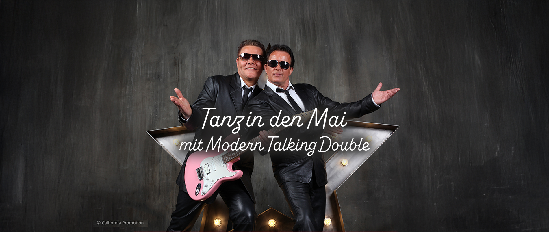 Tanz in den Mai Poster mit Silhouetten von Menschen und Blumen im Hintergrund. Hinweis auf Live-Musik von 'Buffy and his Boys'.